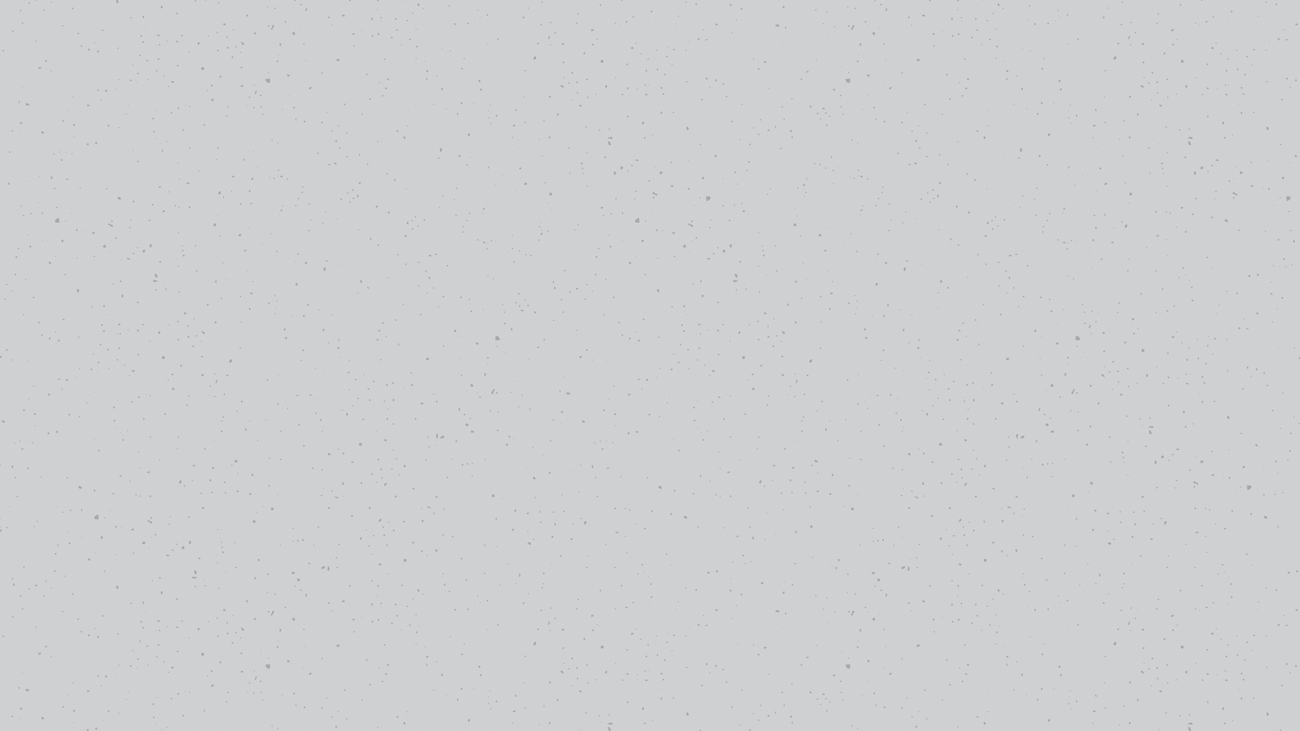 Grey speckled background. 