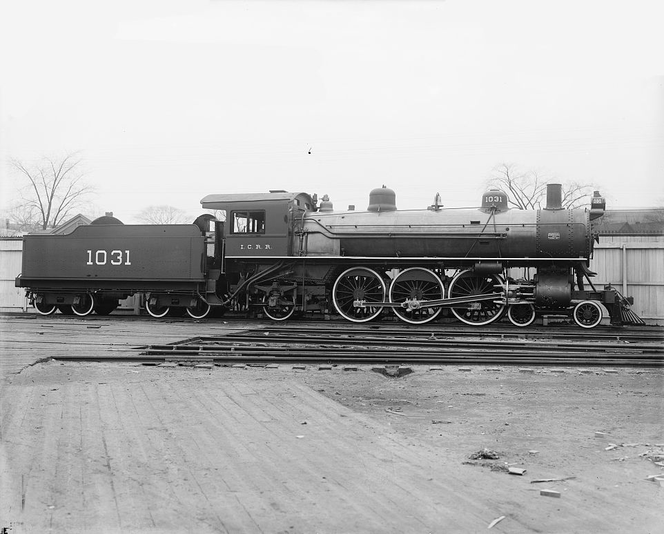 Old time black and white image of a train.